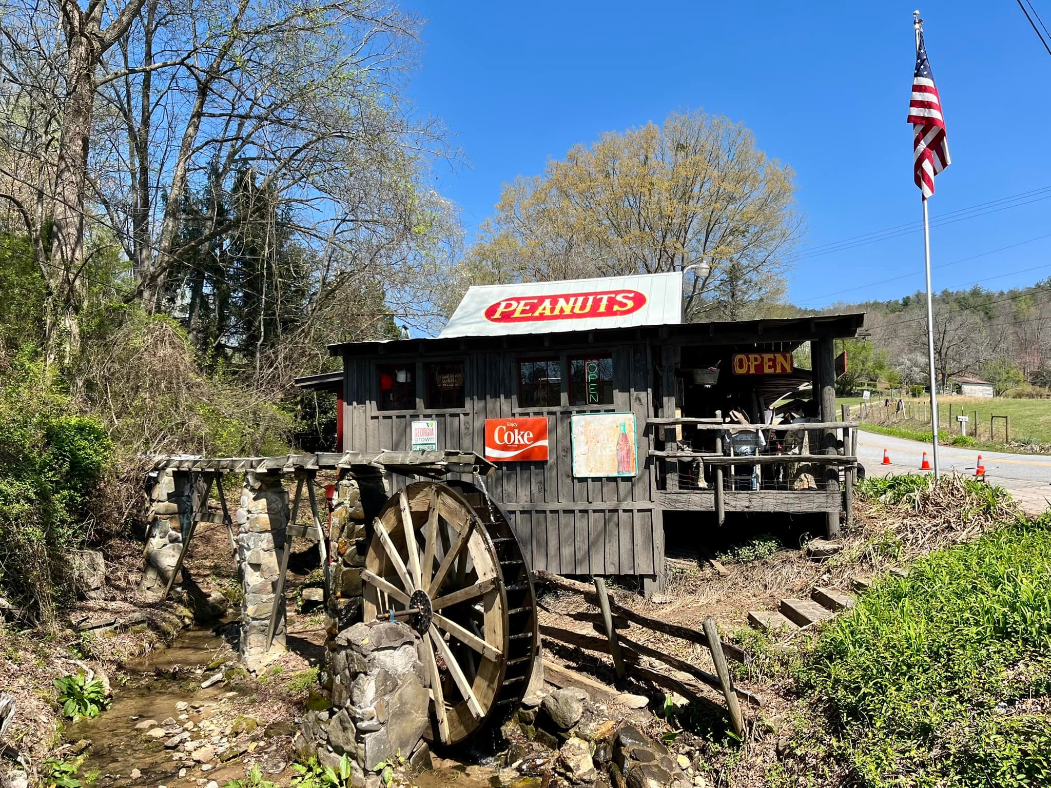 The iconic wooden water wheel at Fred's Famous Peanuts along GA-75